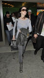 th_80953_Preppie_-_Emily_Blunt_arriving_at_LAX_Airport_-_Feb._5_2010_780_122_338lo.jpg