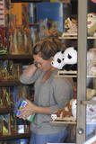 th_10012_Preppie_Hilary_Duff_shops_for_toys_before_grabbing_some_freshly_prepared_coconut_3_122_376lo.jpg