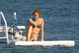 Miley Cyrus In Bikini at Orchard Lake