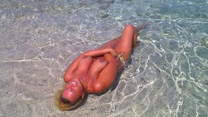 Topless-blonde-babe-and-her-friend-on-beach-g4ewvnkizb.jpg